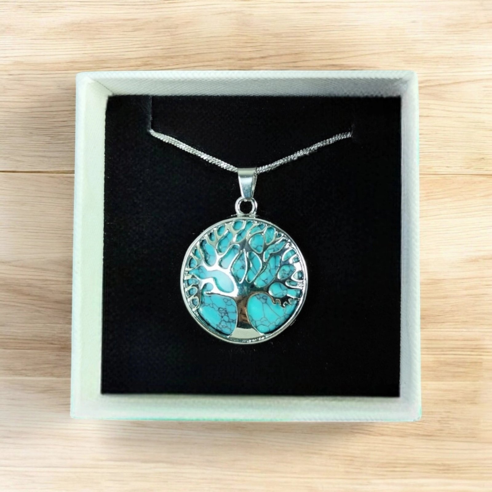 1737023120813 collar arbol de la ida con turquesa